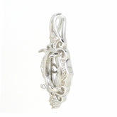 Vintage style sterling silver semi mount pendant setting for 12x10mm cabochon with white topaz accent, side view.